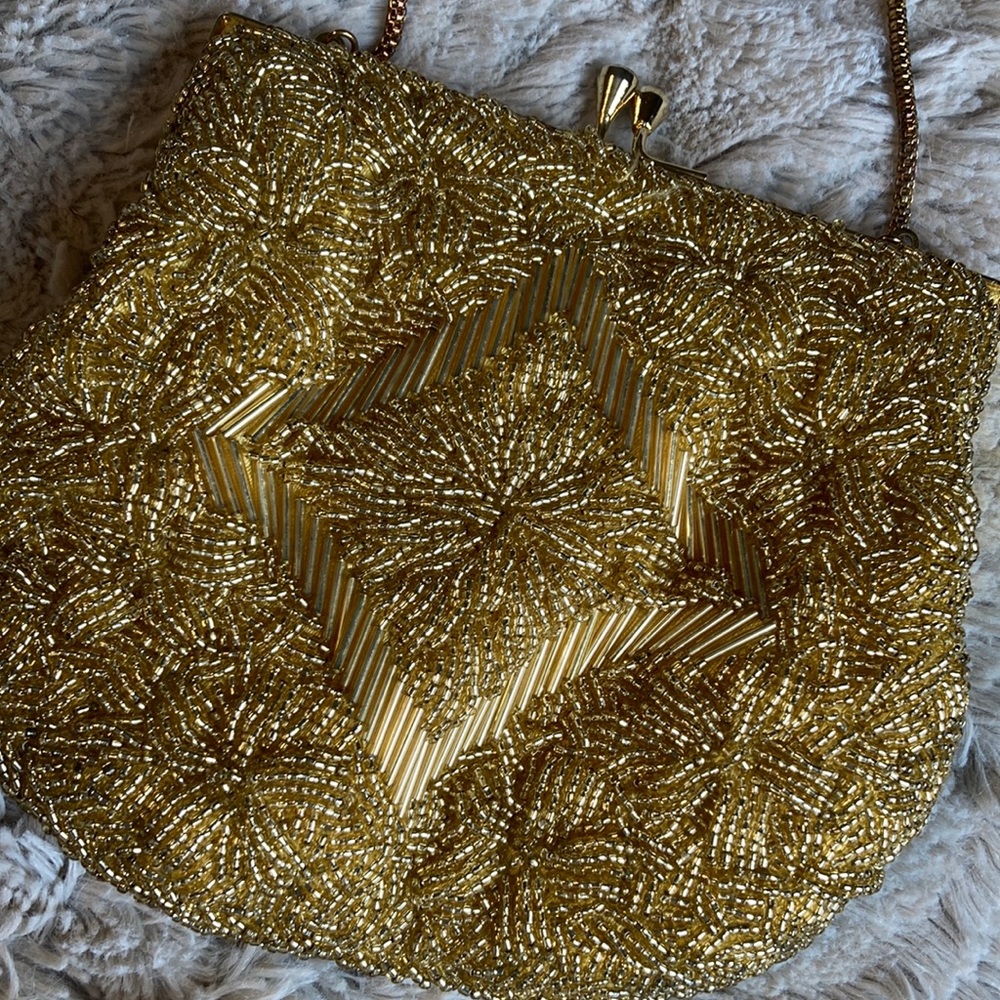 Exquisite vintage gold beaded even bag with strap.